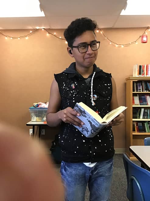 Antonio Zermeño Burgos enjoys his book from an extended library of Spanish books acquired with funding from the Gunnison Valley Education Foundation.